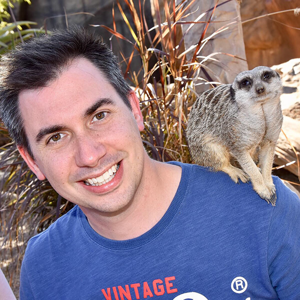 Tom with a meerkat